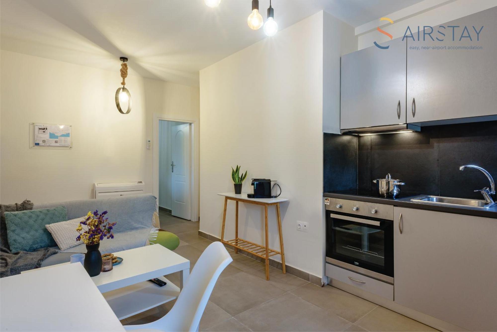 Ryze Apartments Airport By Airstay Артеміда Екстер'єр фото